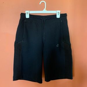 NIKE Women’s Tech Fleece Shorts w/ Mesh Paneling. Black.
